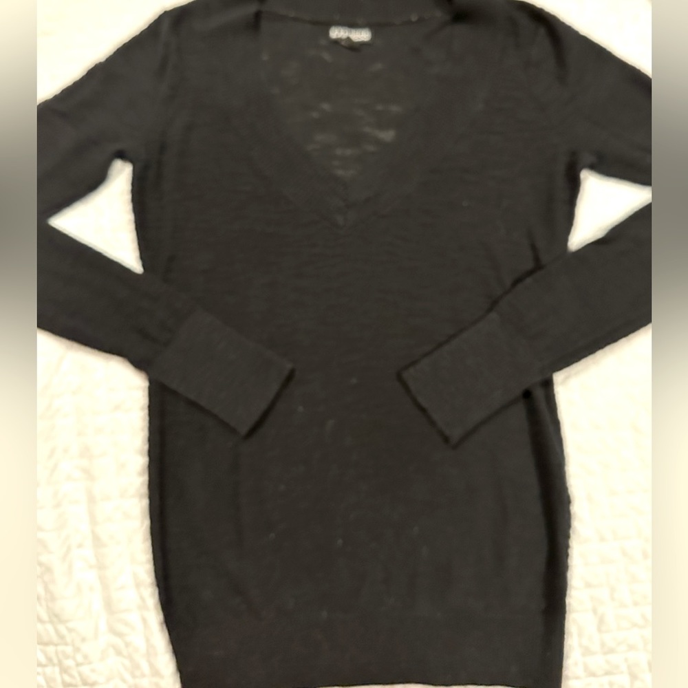 Express size S black deep V-neck very thin sweater with long sleeves cuffed.